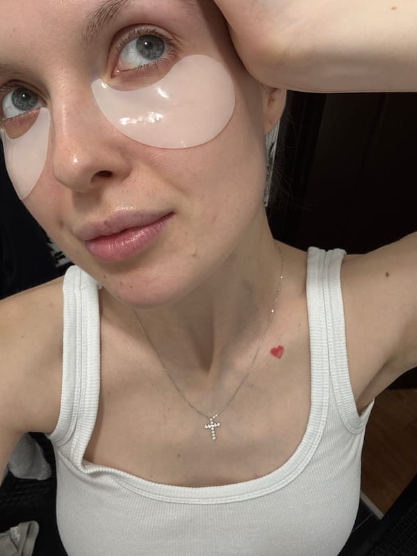 Young person spotted wearing eye masks and cross necklace in Moscow