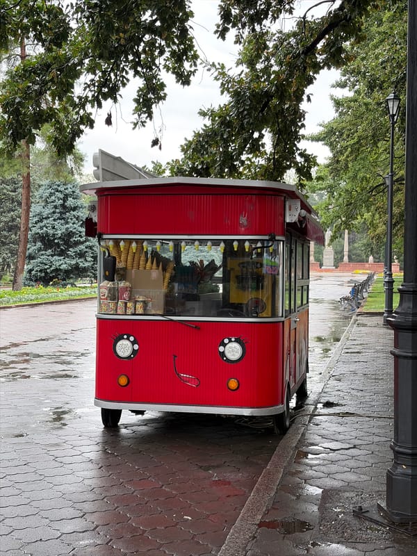 Rainy morning street scenes across central Bishkek