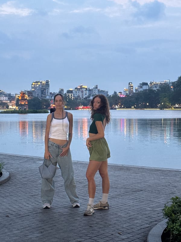 Everyday moments captured around Hanoi's lake and illuminated streets