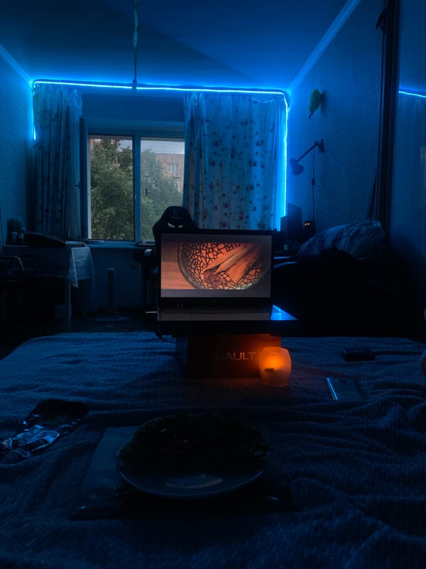 Blue LED-lit bedroom glowing at night in Klin, Russia