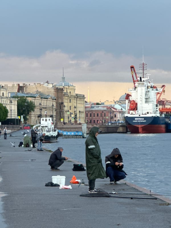 Evening fishing and harbor scenes along Saint Petersburg's Neva embankment