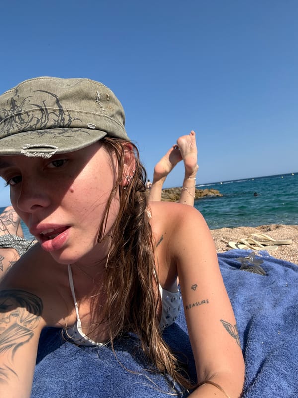 Lazy afternoon on a pebble beach in Platja d'Aro