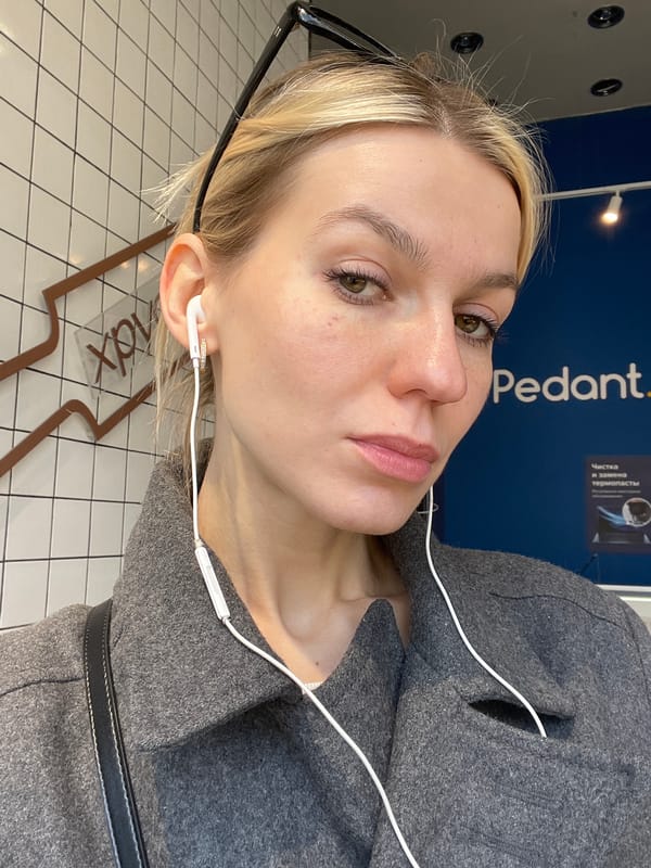 Woman takes selfie at Moscow bakery