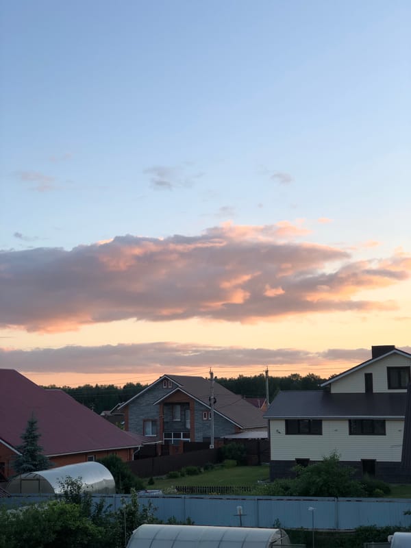 Black Range Rover parked during sunset in Noviy, Russia
