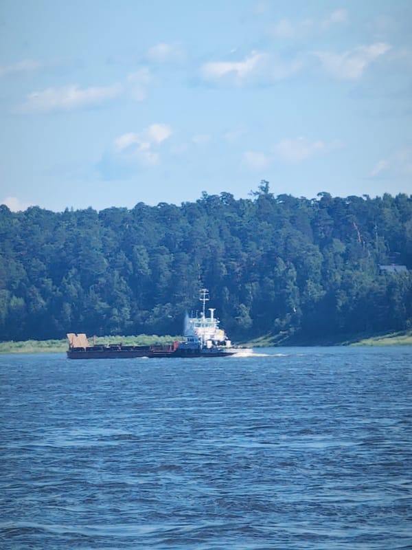 Tugboats, barges, and cranes on the Angara River