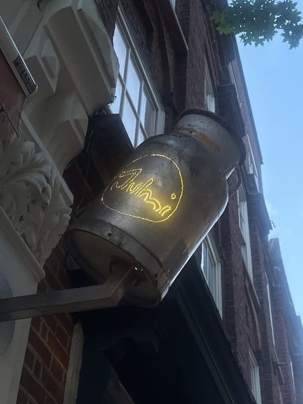 Vintage milk churn sign "Ahasi" spotted in London