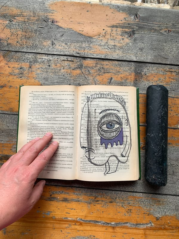 Charcoal drawings made onto a Russian book's pages in Sergeevo