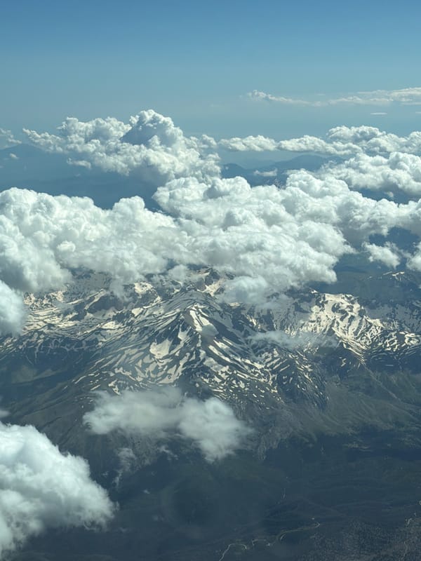 Snowy mountains and clouds observed near Aksu, Turkey