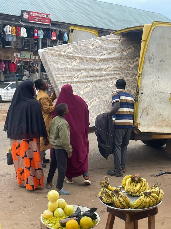 Bukuru street market buzzing with vendors and foot traffic