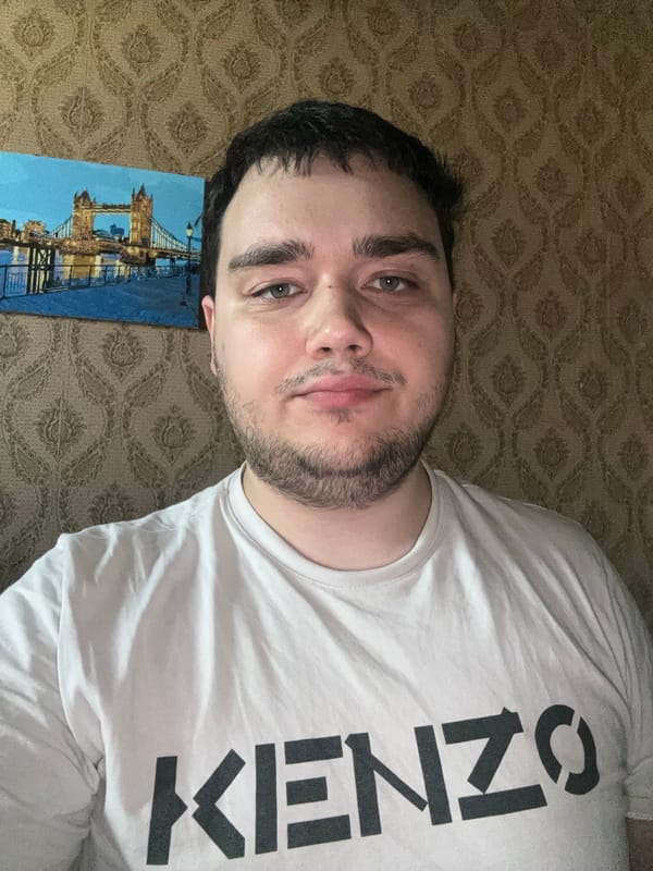 Indoor selfie session featuring a KENZO tee and snack bag