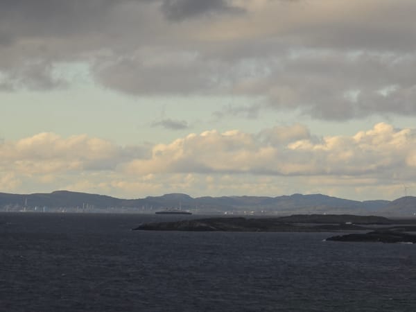 Choppy seascape with rocky islands observed near Stavanger, Norway