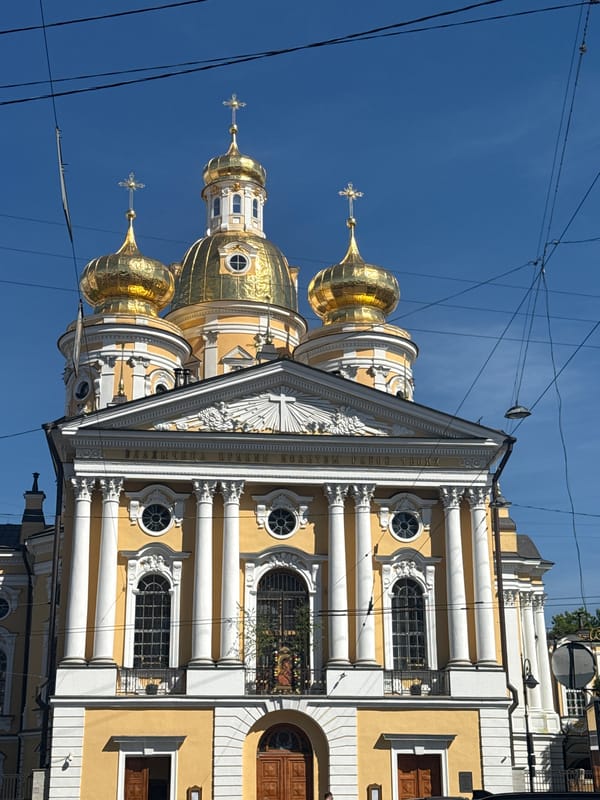 Tourist documents afternoon walk through historic Saint Petersburg landmarks