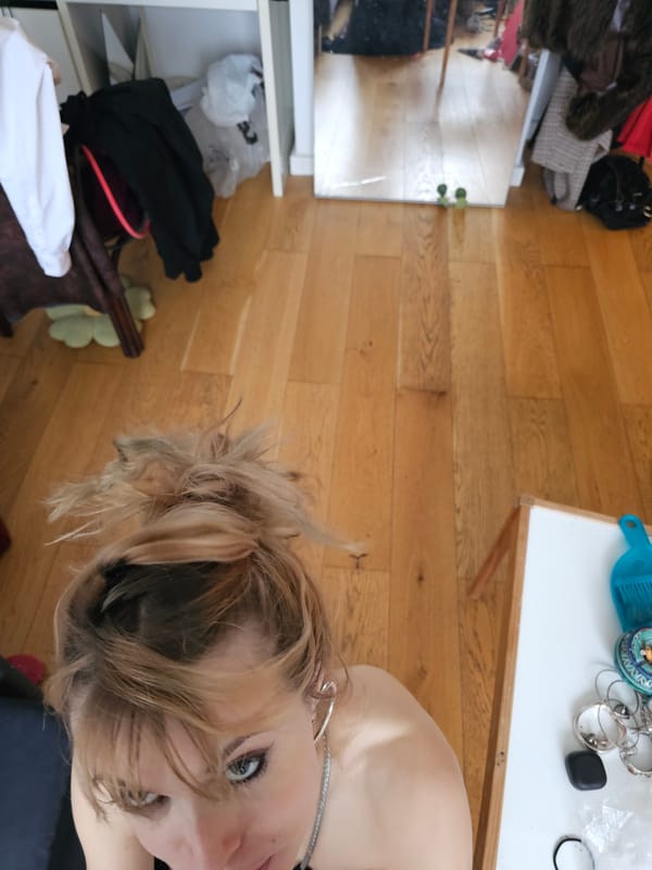 Woman photographed in early morning Pantin apartment setting