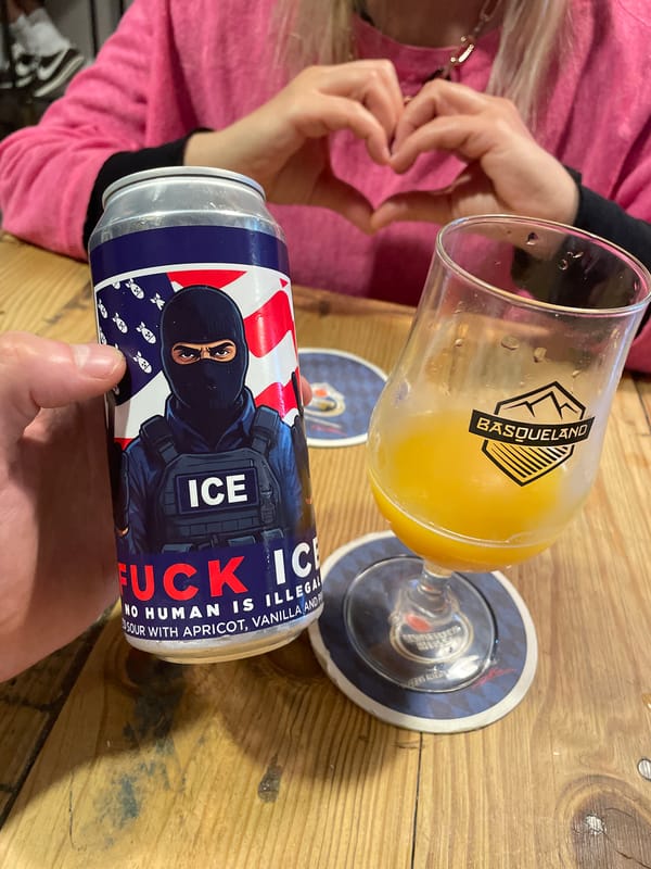 Bar scene captured in Barcelona featuring Spanish brewery branding