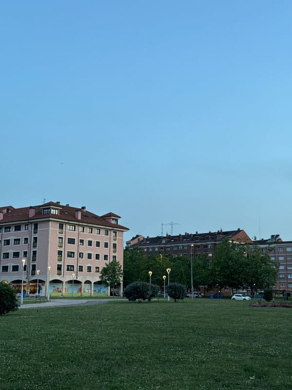 Evening stroll captures Gijón architecture and blooming roses
