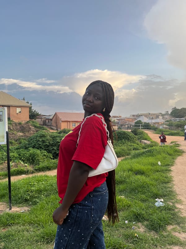Casual afternoon hangout in a Jos, Nigeria neighborhood