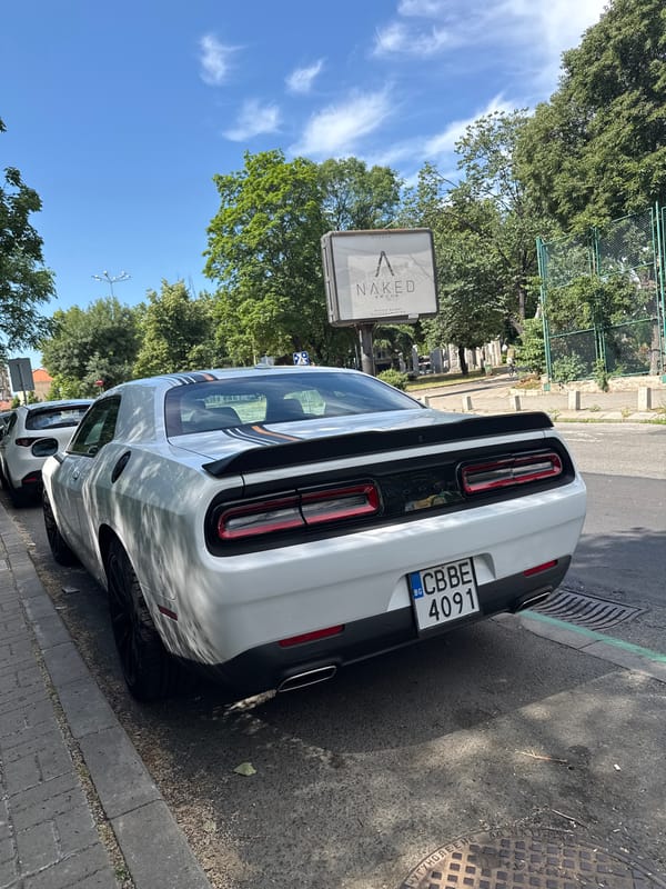 White Dodge Challenger GT draws attention on a Burgas street