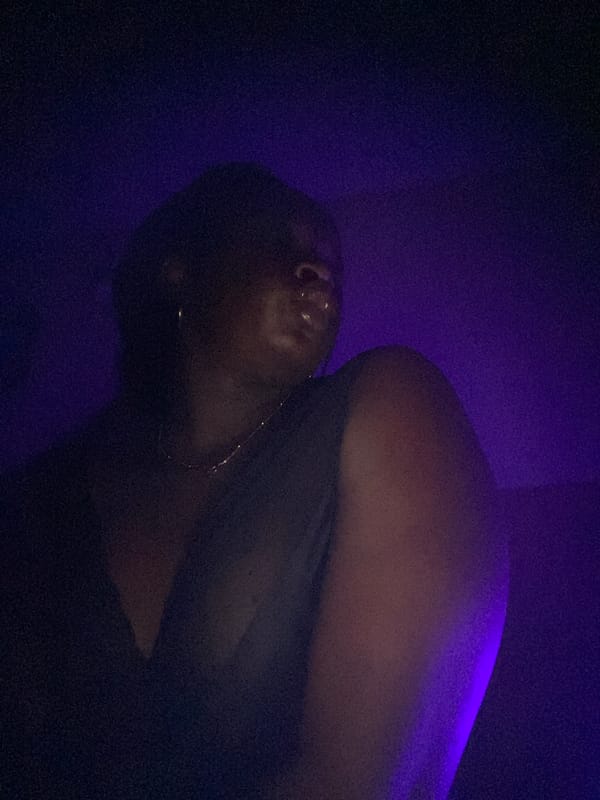 Quiet moments captured in purple light, Maigizo Nigeria