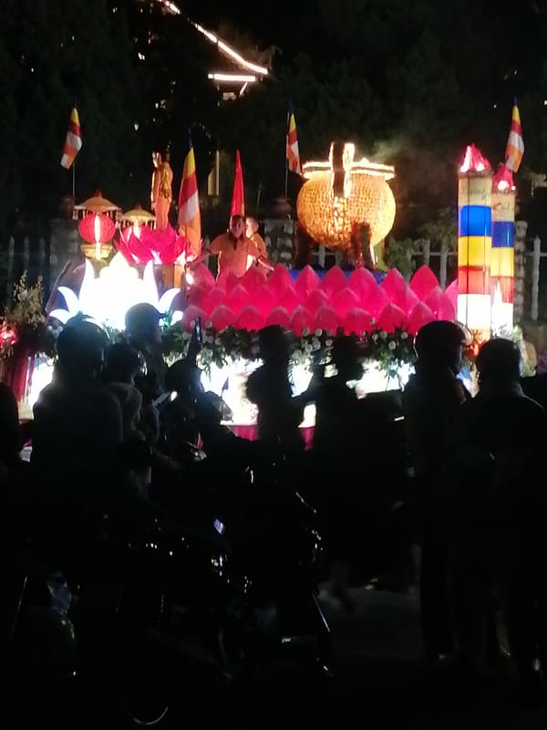 Buddhist procession with illuminated floats parades through Da Lat