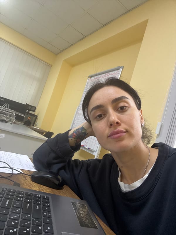 Woman takes selfies in Tbilisi apartment
