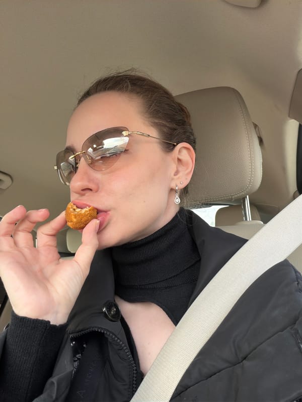 Woman eats while driving on Russian highway