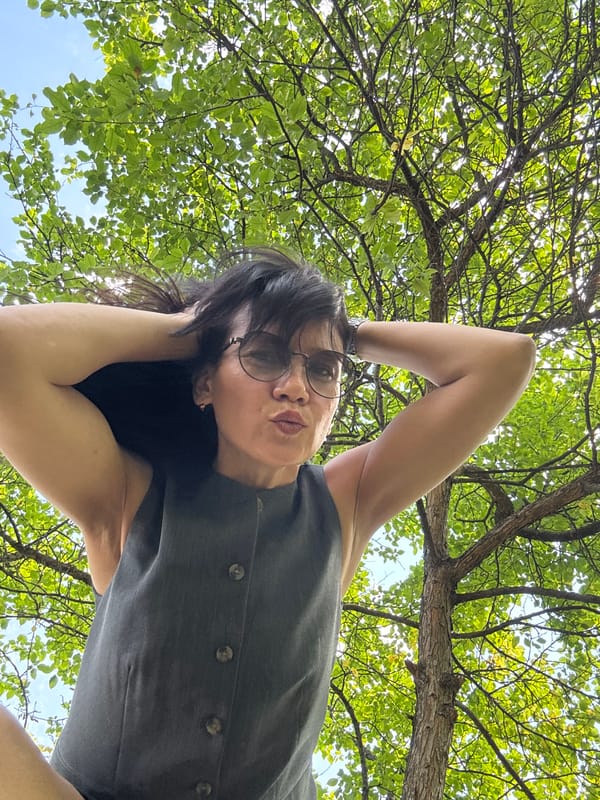 Summer morning photo session across a Chaikovsky park and courtyard