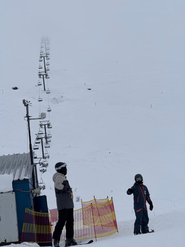Skiers brave foggy conditions at Russian mountain resort