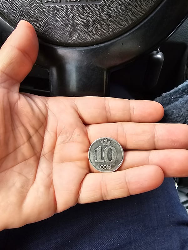Driving through Özgön: landmarks, landscapes, and a local coin