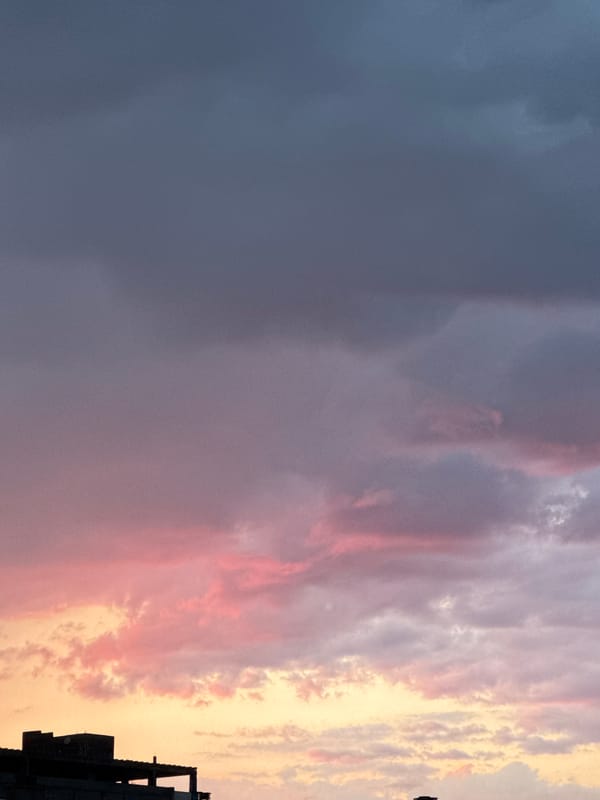 Podgorica skyline caught mid-storm and sunset in one evening
