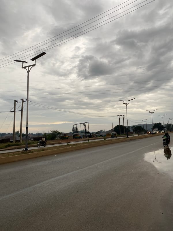 Evening street life documented in Bukuru after rain