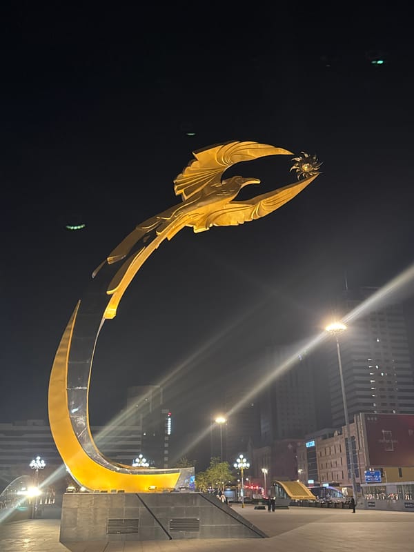Golden bird sculpture illuminated in Shenyang's Shenhe District nightscape