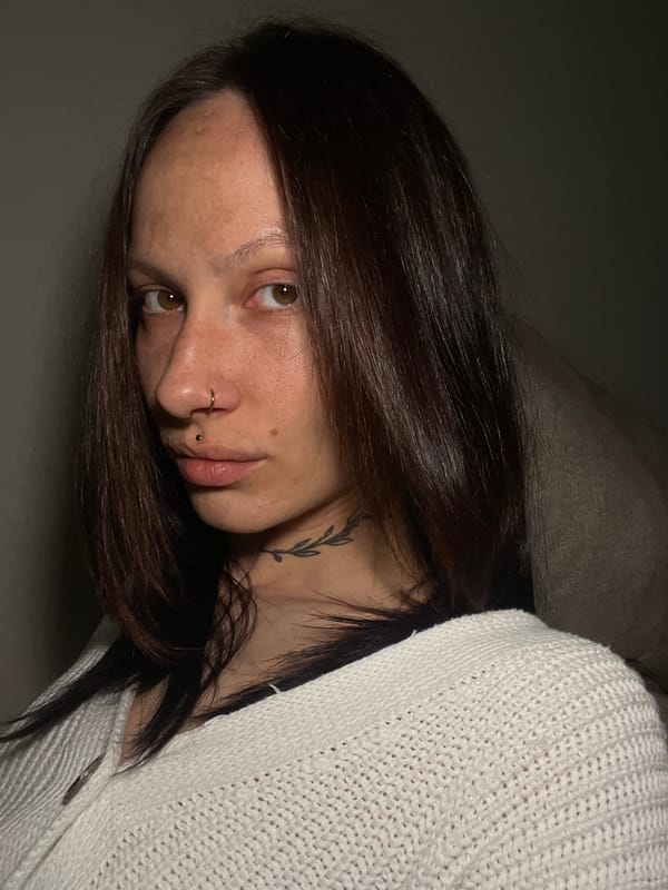 Woman with tattoo, piercings observed resting in Izhevsk