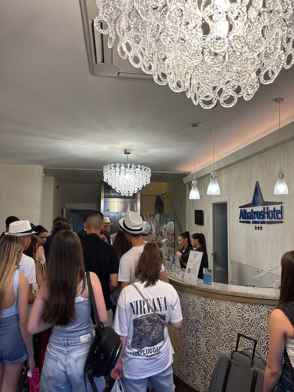 Young tourists document hotel stay and dining in Jesolo
