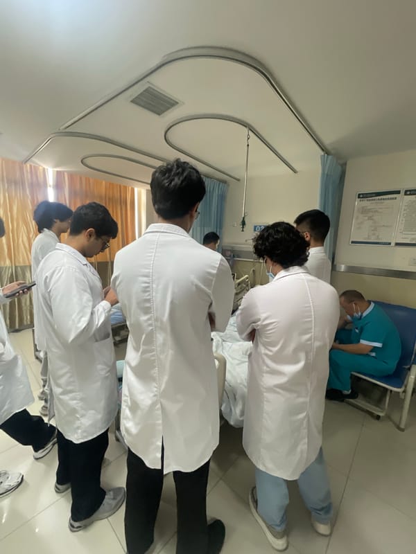 Medical rounds and presentation conducted at Tongliang District hospital