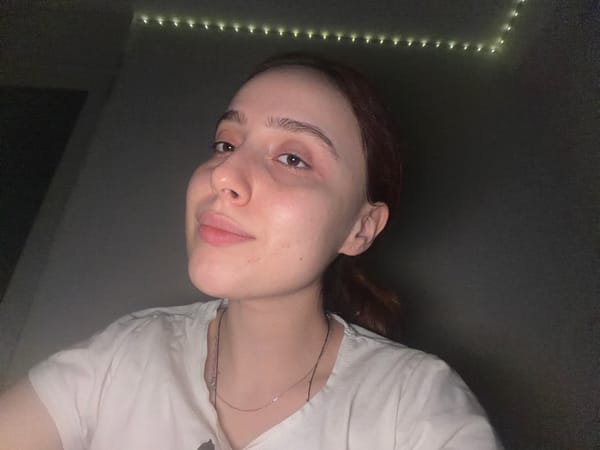 Young woman takes series of selfies in Strasbourg