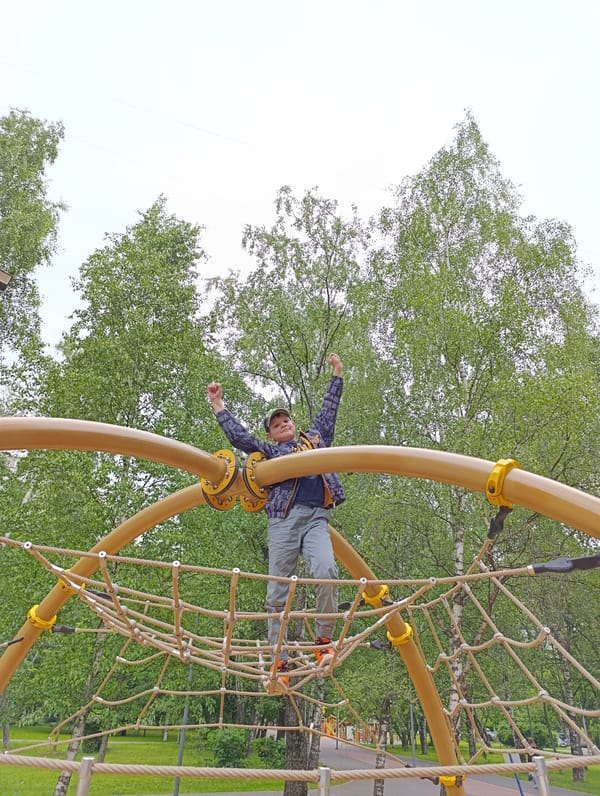 Moscow families enjoy afternoon playground activities in city park