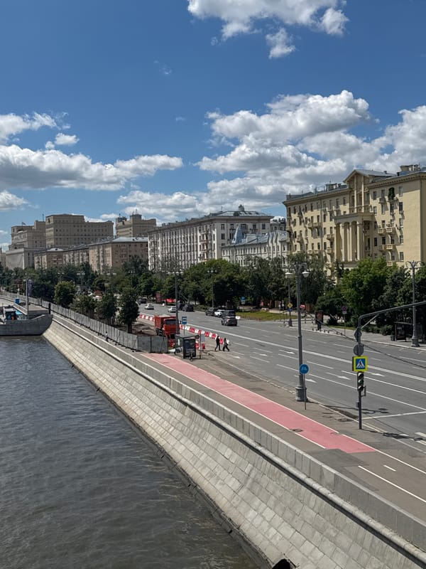 Moscow riverside morning: boats, gardens, and flowers