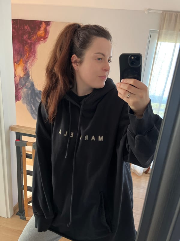 Person pets corgi dog in Gangloff, Germany morning scene