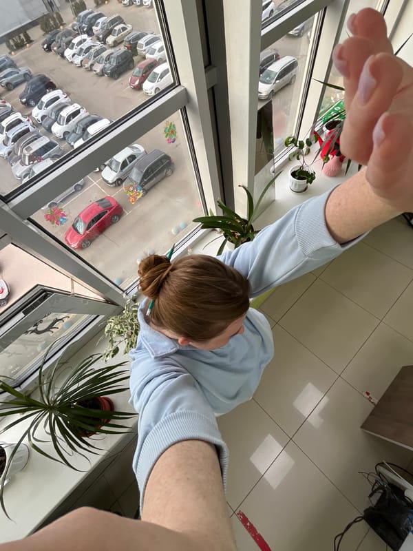 Office worker performs desk calculations and paperwork in Russia