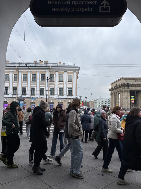 Pedestrians cross street on Nevsky Prospekt, Saint Petersburg