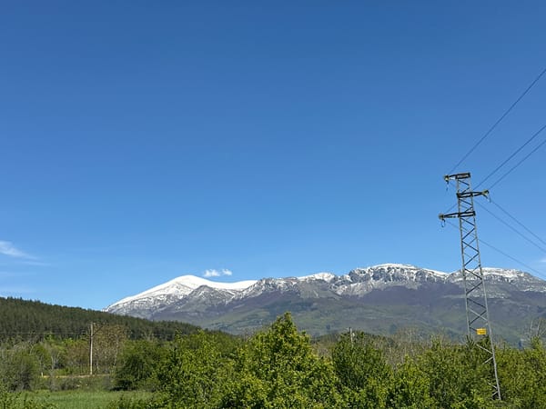 Mountain landscapes documented near Bulgarian villages under clear skies
