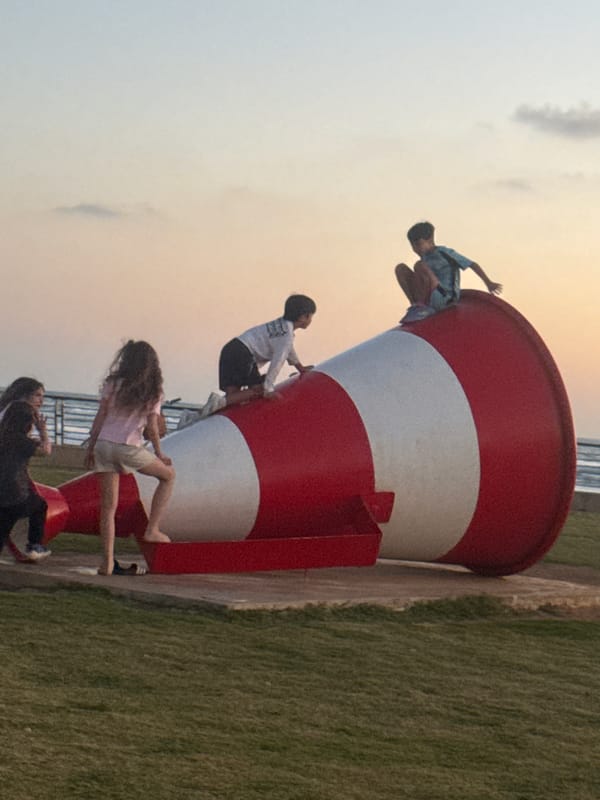 Sunset concert draws crowds to Tel Aviv waterfront boardwalk
