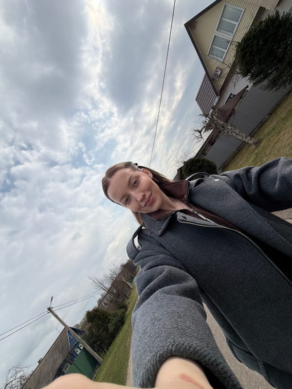 Woman strolls with baby, takes selfie in Reshetnikovo