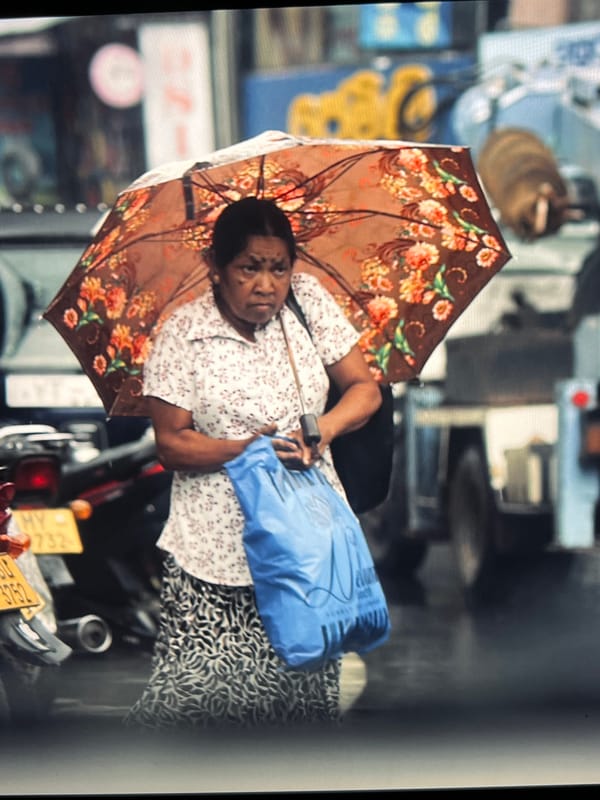 Market scenes with woman and fruit stall documented