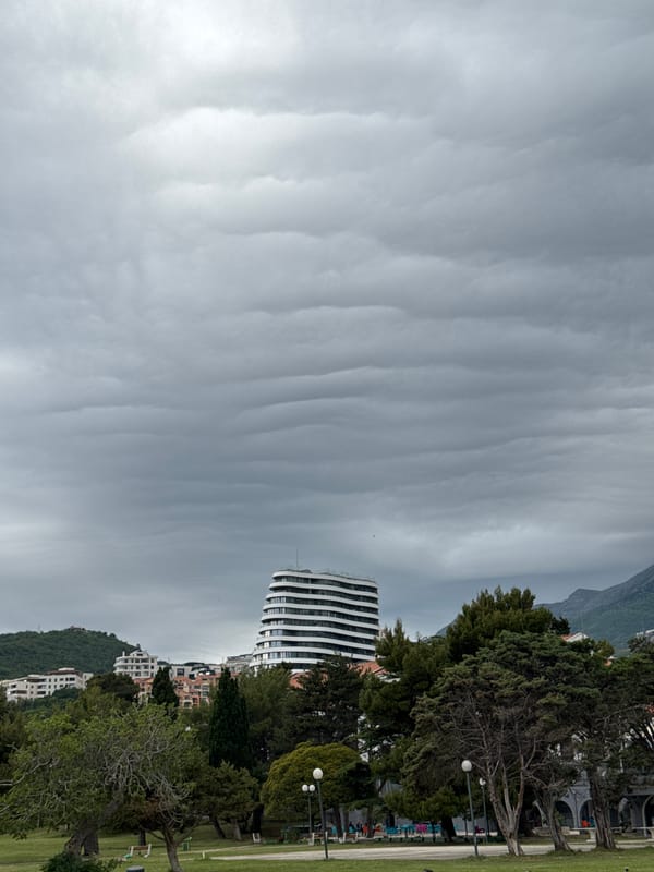 Altocumulus clouds observed over modern building in Montenegro