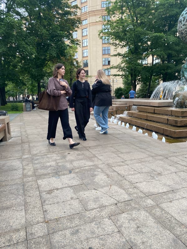 Afternoon foot traffic around Moscow's ornate public fountains
