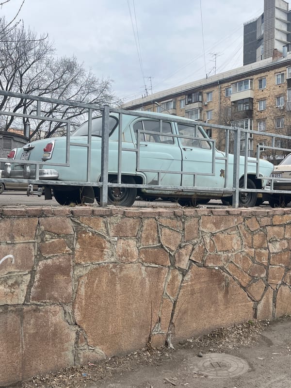 Morning urban wanderings capture architecture, vehicles, everyday city life