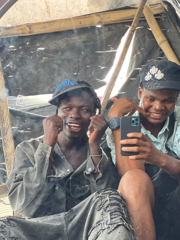 Mirror selfies and street life in Ojomu, Nigeria