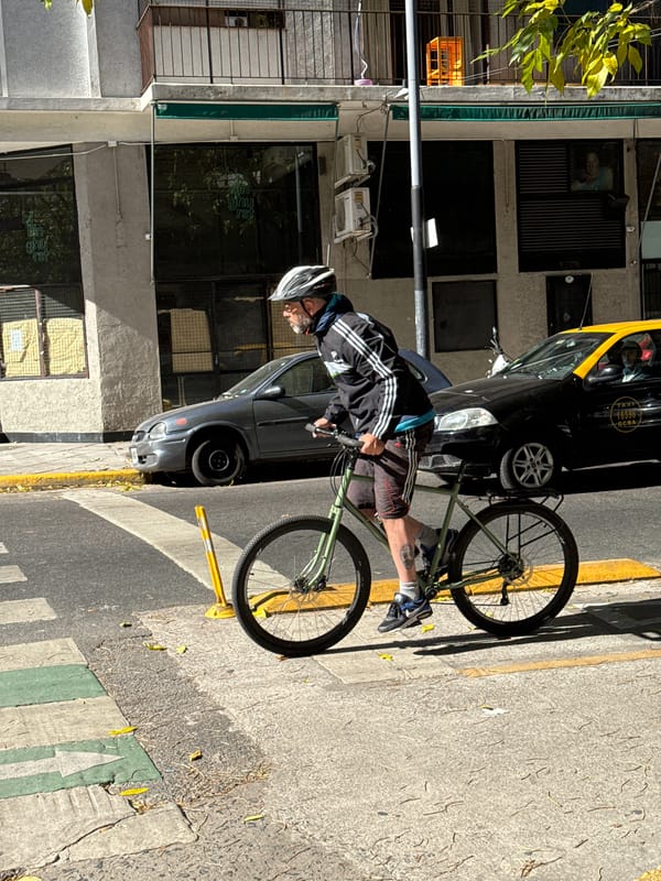Buenos Aires street scenes include vehicle crash, cyclists, routine activity