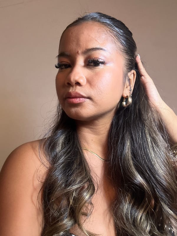 Woman records selfie videos in Celuk, Indonesia